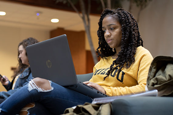 Student working on laptop