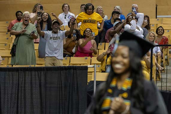 Family cheers for their graduating student
