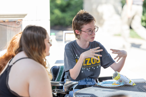 Students having a meeting outdoors