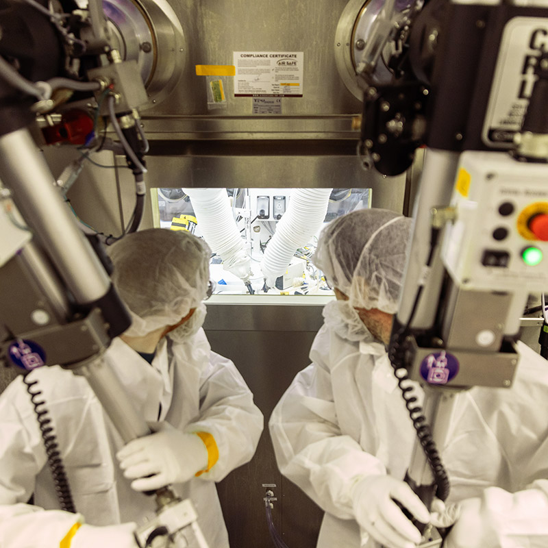 Scientists using equipment