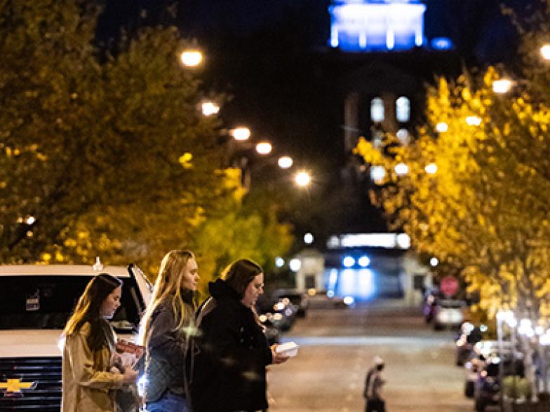 A nighttime image of 8th street looking back toward Jesse Hall