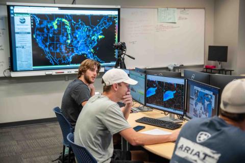 Students working on computers in a classroom